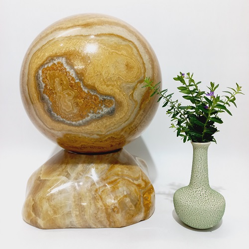 Quả cầu phong thủy đá Canxit vàng